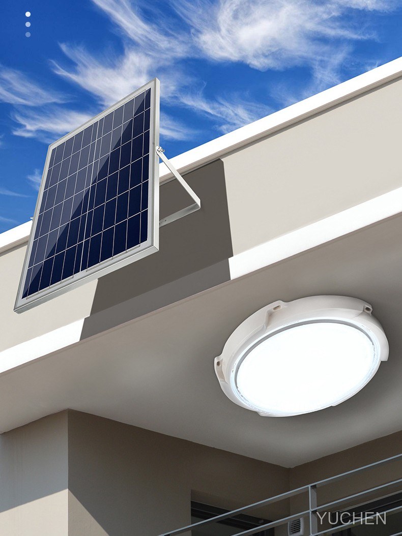 Solar panel on the wall and ceiling light under the eave