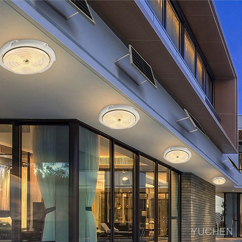Solar ceiling light under a roof eave at dusk